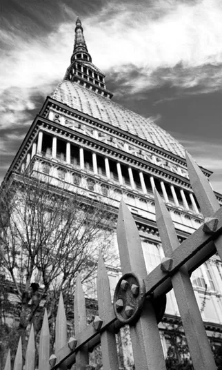 Black and white view looking up at the Mole Antonelliana in Turin