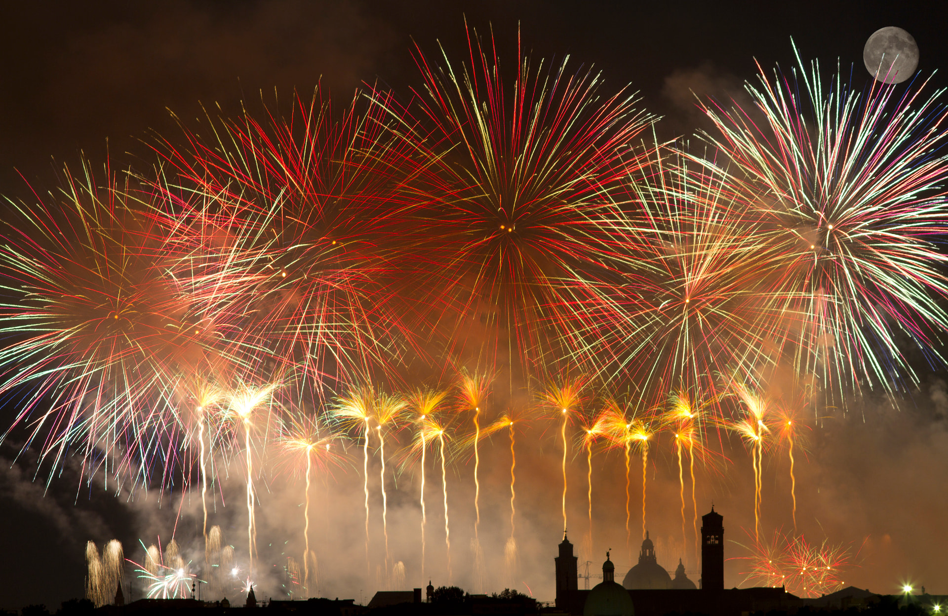Fireworks over the Venice skyline during the Festa del Redentore