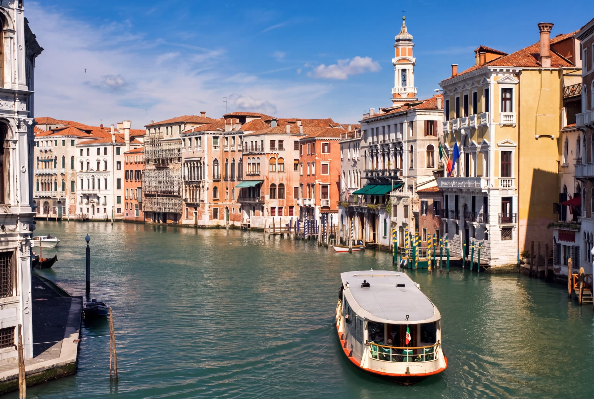 Vaporetto travelling along Venice's Grand Canal between historic palaces